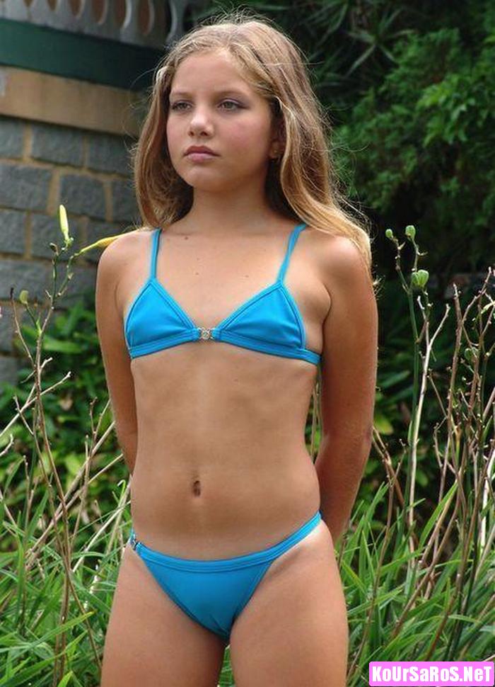 young girl in tight blue bikini 700x970